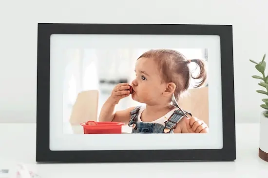 Skylight Frame with image of child eating a strawberry 